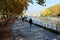 Promenade le long du quai Notre-Dame aÂ Tournai en Belgique en automne. Pont des trous en perspective